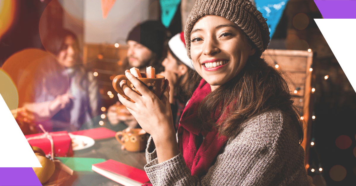 Christmas hampers you need on your wishlist - lady holding mug of hot cider